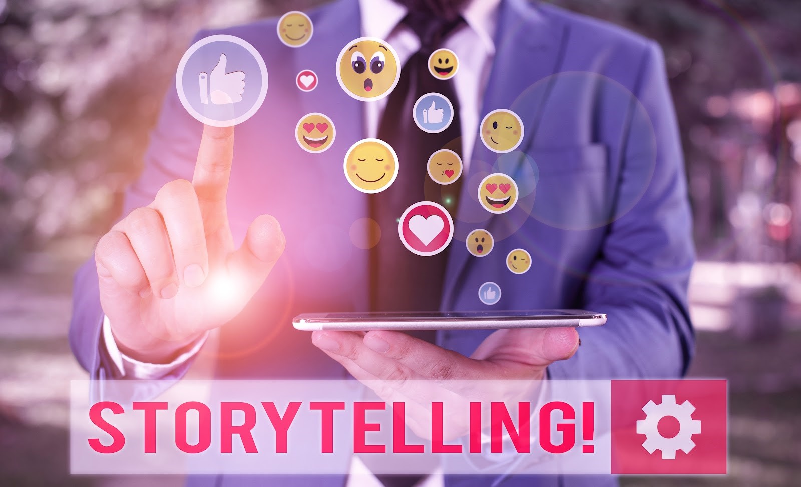Stock photo of a man in a business suit pointing at emoji reactions to the word "Storytelling" underneath.